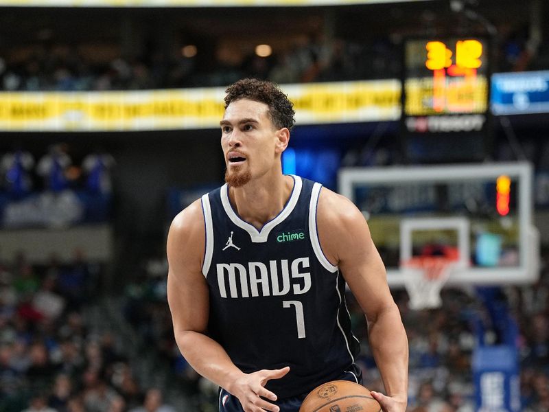 DALLAS, TX - NOVEMBER 8: Dwight Powell #7 of the Dallas Mavericks looks to pass the ball during the game against the Phoenix Suns on November 6, 2024 at the American Airlines Center in Dallas, Texas. NOTE TO USER: User expressly acknowledges and agrees that, by downloading and or using this photograph, User is consenting to the terms and conditions of the Getty Images License Agreement. Mandatory Copyright Notice: Copyright 2024 NBAE (Photo by Glenn James/NBAE via Getty Images)