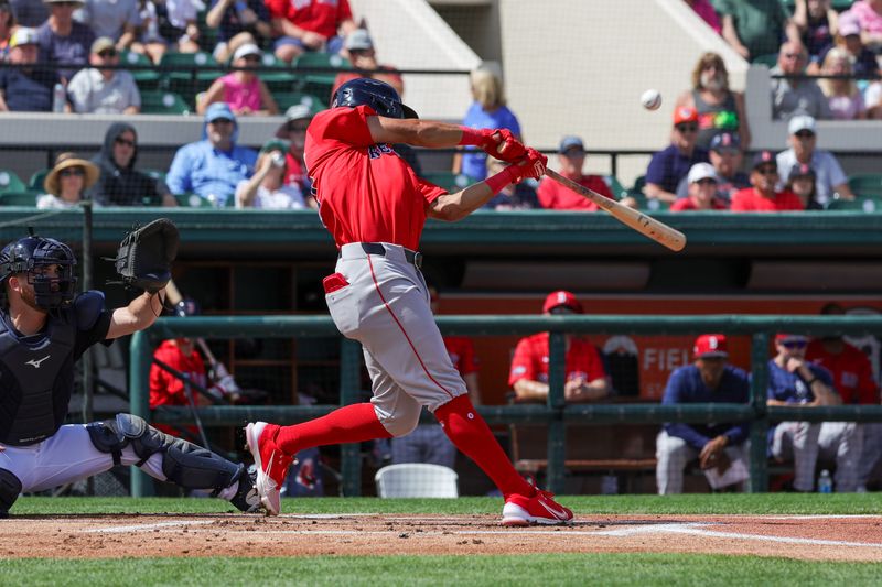 Mar 4, 2024; Lakeland, Florida, USA; Boston Red Sox shortstop David Hamilton (70) doubles during the first inning against the Detroit Tigers at Publix Field at Joker Marchant Stadium. Mandatory Credit: Mike Watters-USA TODAY Sports