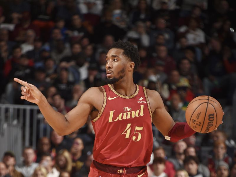 CLEVELAND, OH - JANUARY 29: Donovan Mitchell #45 of the Cleveland Cavaliers dribbles the ball during the game against the LA Clippers on January 29, 2024 at Rocket Mortgage FieldHouse in Cleveland, Ohio. NOTE TO USER: User expressly acknowledges and agrees that, by downloading and/or using this Photograph, user is consenting to the terms and conditions of the Getty Images License Agreement. Mandatory Copyright Notice: Copyright 2024 NBAE (Photo by David Liam Kyle/NBAE via Getty Images)