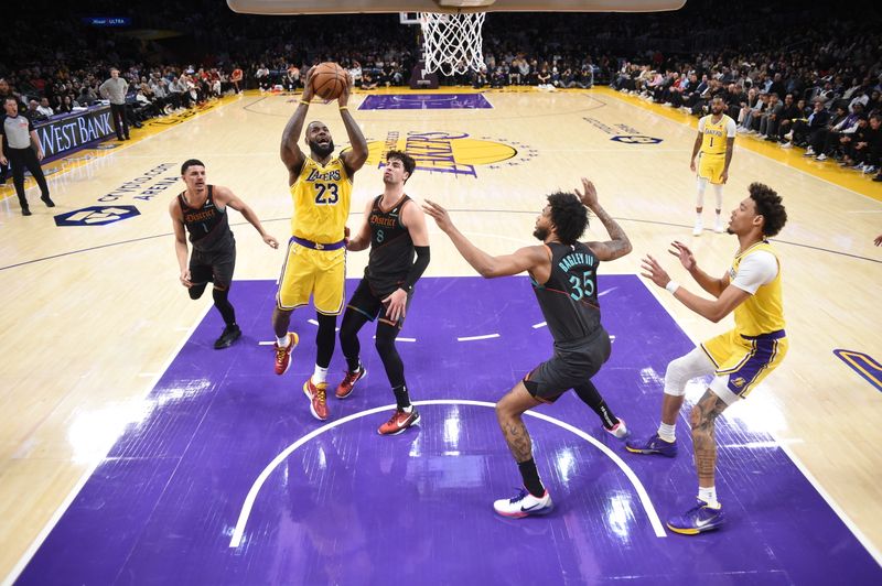 LOS ANGELES, CA - FEBRUARY 29:  LeBron James #23 of the Los Angeles Lakers goes to the basket during the game on February 29, 2024 at Crypto.Com Arena in Los Angeles, California. NOTE TO USER: User expressly acknowledges and agrees that, by downloading and/or using this Photograph, user is consenting to the terms and conditions of the Getty Images License Agreement. Mandatory Copyright Notice: Copyright 2024 NBAE (Photo by Juan Ocampo/NBAE via Getty Images)