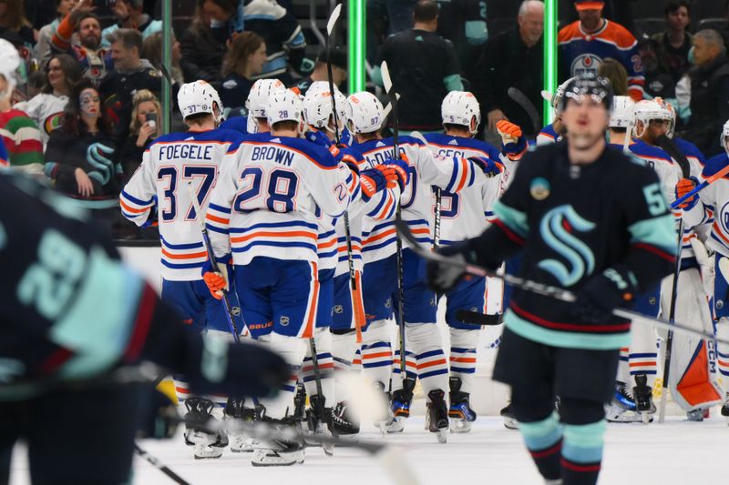 Mar 2, 2024; Seattle, Washington, USA; The Edmonton Oilers celebrate defeating the Seattle Kraken at Climate Pledge Arena. Mandatory Credit: Steven Bisig-USA TODAY Sports