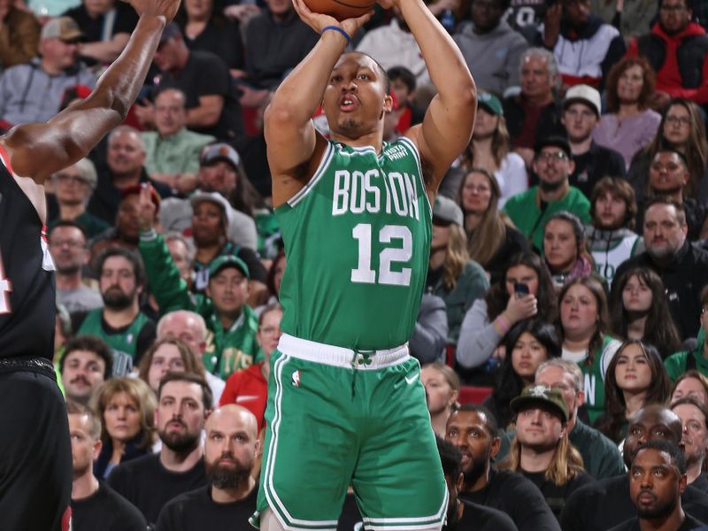 PORTLAND, OR - MARCH 17: Grant Williams #12 of the Boston Celtics shoots the ball during the game against the Portland Trail Blazers on March 17, 2023 at the Moda Center Arena in Portland, Oregon. NOTE TO USER: User expressly acknowledges and agrees that, by downloading and or using this photograph, user is consenting to the terms and conditions of the Getty Images License Agreement. Mandatory Copyright Notice: Copyright 2023 NBAE (Photo by Cameron Browne/NBAE via Getty Images)