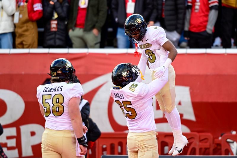 Nov 25, 2023; Salt Lake City, Utah, USA; Colorado Buffaloes running back Dylan Edwards (3) reacts after scoring a touchdown against the Utah Utes at Rice-Eccles Stadium. Mandatory Credit: Christopher Creveling-USA TODAY Sports