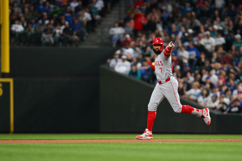 May 31, 2024; Seattle, Washington, USA; Los Angeles Angels pinch hitter Jo Adell (7) celebrates after hitting a grand slam against the Seattle Mariners during the seventh inning at T-Mobile Park. Mandatory Credit: Steven Bisig-USA TODAY Sports