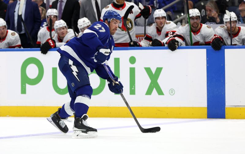 Oct 9, 2025; Tampa, Florida, USA; Tampa Bay Lightning defenseman Ryan McDonagh (27) passes the puck against the Ottawa Senators during the third period at Benchmark International Arena. Mandatory Credit: Kim Klement Neitzel-Imagn Images