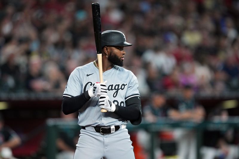 Jun 15, 2024; Phoenix, Arizona, USA; Chicago White Sox outfielder Luis Robert Jr. (88) bats against the Arizona Diamondbacks during the first inning at Chase Field. Mandatory Credit: Joe Camporeale-USA TODAY Sports