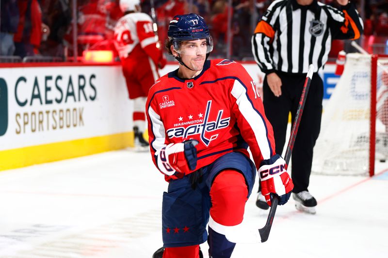 Mar 26, 2024; Washington, District of Columbia, USA; Washington Capitals center Dylan Strome (17) celebrates after scoring a goal against the Detroit Red Wings during the third period at Capital One Arena. Mandatory Credit: Amber Searls-USA TODAY Sports