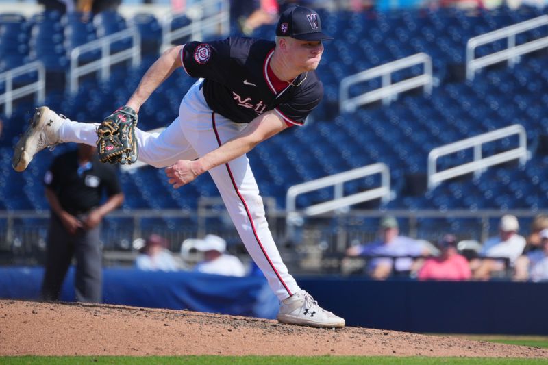 Feb 28, 2024; West Palm Beach, Florida, USA;  Washington Nationals relief pitcher DJ Herz (74) pitches in the sixth inning against the Boston Red Sox at The Ballpark of the Palm Beaches. Mandatory Credit: Jim Rassol-USA TODAY Sports