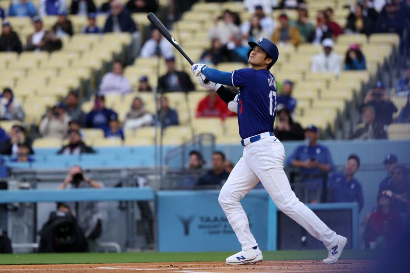 Mar 24, 2024; Los Angeles, California, USA;  Los Angeles Dodgers designated hitter Shohei Ohtani (17) flies out during the first inning against the Los Angeles Angels at Dodger Stadium. Mandatory Credit: Kiyoshi Mio-USA TODAY Sports