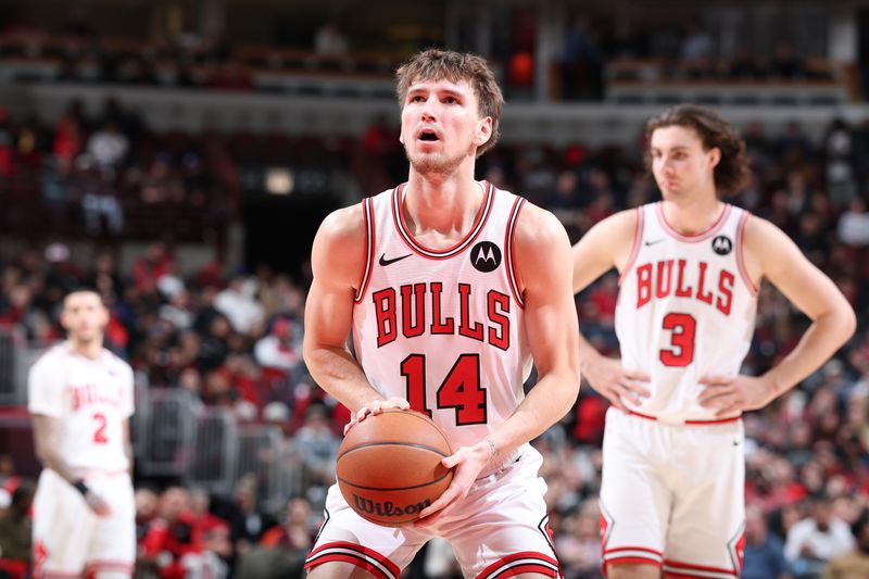 CHICAGO, IL - DECEMBER 2: Matas Buzelis #14 of Chicago Bulls shoots a free throw during the game against the Brooklyn Nets on December 2, 2024 at United Center in Chicago, Illinois. NOTE TO USER: User expressly acknowledges and agrees that, by downloading and or using this photograph, User is consenting to the terms and conditions of the Getty Images License Agreement. Mandatory Copyright Notice: Copyright 2024 NBAE (Photo by Jeff Haynes/NBAE via Getty Images)