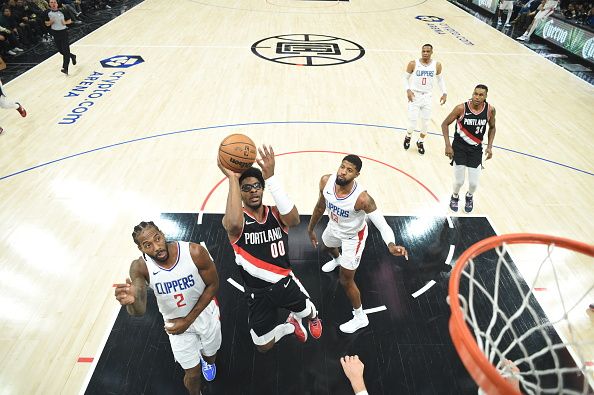 LOS ANGELES, CA - DECEMBER 11: Scoot Henderson #00 of the Portland Trail Blazers drives to the basket during the game against the LA Clippers on December 11, 2023 at Crypto.Com Arena in Los Angeles, California. NOTE TO USER: User expressly acknowledges and agrees that, by downloading and/or using this Photograph, user is consenting to the terms and conditions of the Getty Images License Agreement. Mandatory Copyright Notice: Copyright 2023 NBAE (Photo by Adam Pantozzi/NBAE via Getty Images)