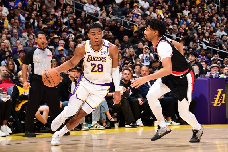 LOS ANGELES, CA - DECEMBER 8: Rui Hachimura #28 of the Los Angeles Lakers drives to the basket during the game against the Portland Trail Blazers on December 8, 2024 at Crypto.Com Arena in Los Angeles, California. NOTE TO USER: User expressly acknowledges and agrees that, by downloading and/or using this Photograph, user is consenting to the terms and conditions of the Getty Images License Agreement. Mandatory Copyright Notice: Copyright 2024 NBAE (Photo by Adam Pantozzi/NBAE via Getty Images)