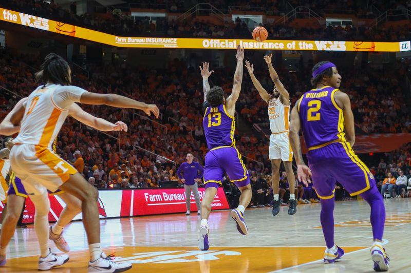 Feb 7, 2024; Knoxville, Tennessee, USA; Tennessee Volunteers guard Josiah-Jordan James (30) shoots a three pointer against the LSU Tigers during the second half at Thompson-Boling Arena at Food City Center. Mandatory Credit: Randy Sartin-USA TODAY Sports