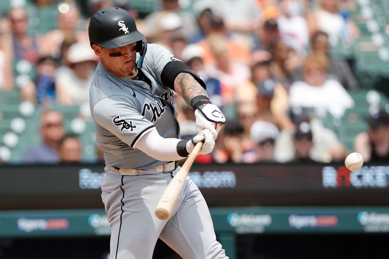 Jun 22, 2024; Detroit, Michigan, USA;  Chicago White Sox catcher Korey Lee (26) hits a home run in the sixth inning against the Detroit Tigers at Comerica Park. Mandatory Credit: Rick Osentoski-USA TODAY Sports