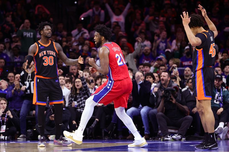 PHILADELPHIA, PENNSYLVANIA - FEBRUARY 10: Joel Embiid #21 of the Philadelphia 76ers reacts during the fourth quarter against the New York Knicks at Wells Fargo Center on February 10, 2023 in Philadelphia, Pennsylvania. NOTE TO USER: User expressly acknowledges and agrees that, by downloading and or using this photograph, User is consenting to the terms and conditions of the Getty Images License Agreement. (Photo by Tim Nwachukwu/Getty Images)