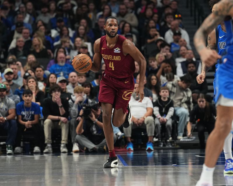 DALLAS, TX - JANUARY 03:  Evan Mobley #4 of the Cleveland Cavaliers dribbles the ball during the game against the Dallas Mavericks on January 3, 2025 at American Airlines Center in Dallas, Texas. NOTE TO USER: User expressly acknowledges and agrees that, by downloading and or using this photograph, User is consenting to the terms and conditions of the Getty Images License Agreement. Mandatory Copyright Notice: Copyright 2025 NBAE (Photo by Glenn James/NBAE via Getty Images)