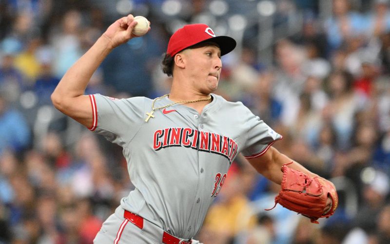 Aug 19, 2024; Toronto, Ontario, CAN; Cincinnati Reds starting pitcher Julian Aguiar (39) delivers a pitch against the Toronto Blue Jays in the first inning at Rogers Centre. Mandatory Credit: Dan Hamilton-USA TODAY Sports