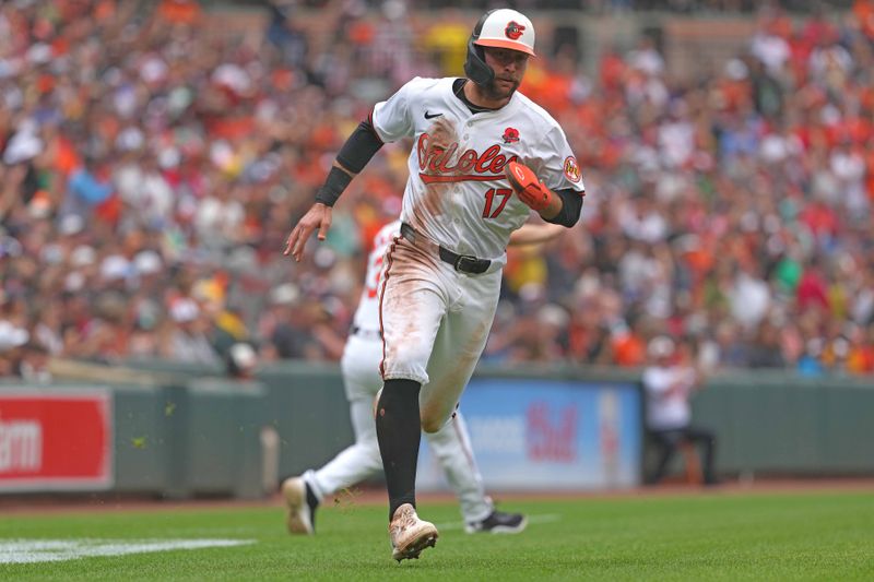 May 27, 2024; Baltimore, Maryland, USA; Baltimore Orioles outfielder Colton Cowser (17) rounds third base to score in the fourth inning against the Boston Red Sox at Oriole Park at Camden Yards. Mandatory Credit: Mitch Stringer-USA TODAY Sports