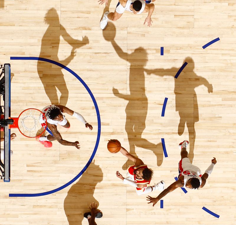 DETROIT, MI - FEBRUARY 3:  Trae Young #11 of the Atlanta Hawks shoots the ball during the game against the New Orleans Pelicans on February 3, 2025 at Little Caesars Arena in Detroit, Michigan. NOTE TO USER: User expressly acknowledges and agrees that, by downloading and/or using this photograph, User is consenting to the terms and conditions of the Getty Images License Agreement. Mandatory Copyright Notice: Copyright 2025 NBAE (Photo by Brian Sevald/NBAE via Getty Images)