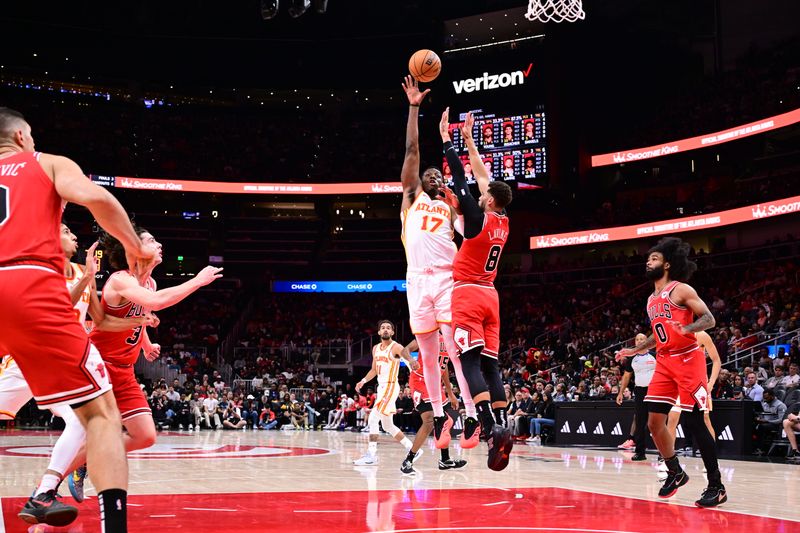 ATLANTA, GA - NOVEMBER 9: Onyeka Okongwu #17 of the Atlanta Hawks shoots the ball during the game against the Chicago Bulls on November 9, 2024 at State Farm Arena in Atlanta, Georgia.  NOTE TO USER: User expressly acknowledges and agrees that, by downloading and/or using this Photograph, user is consenting to the terms and conditions of the Getty Images License Agreement. Mandatory Copyright Notice: Copyright 2024 NBAE (Photo by Adam Hagy/NBAE via Getty Images)