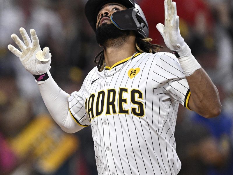 Jun 20, 2024; San Diego, California, USA; San Diego Padres right fielder Fernando Tatis Jr. (23) celebrates after hitting a home run against the Milwaukee Brewers during the fifth inning at Petco Park. Mandatory Credit: Orlando Ramirez-USA TODAY Sports