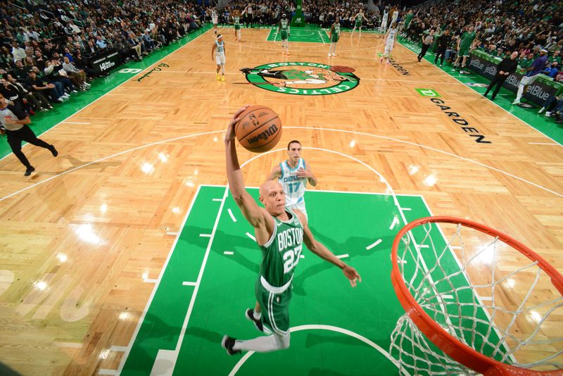 BOSTON, MA - APRIL 12:  Jordan Walsh #27 of the Boston Celtics drives to the basket during the game against the Charlotte Hornets on April 12, 2024 at the TD Garden in Boston, Massachusetts. NOTE TO USER: User expressly acknowledges and agrees that, by downloading and or using this photograph, User is consenting to the terms and conditions of the Getty Images License Agreement. Mandatory Copyright Notice: Copyright 2024 NBAE  (Photo by Brian Babineau/NBAE via Getty Images)