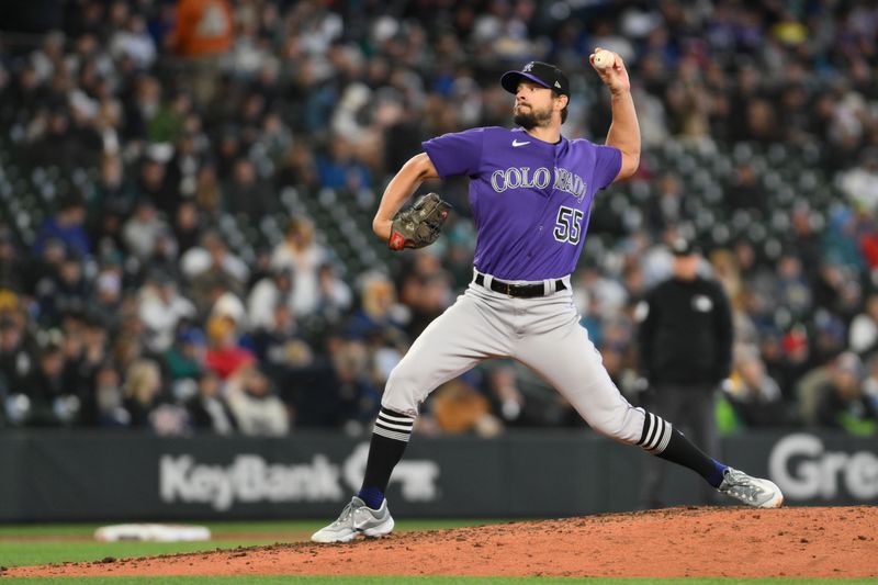 Apr 16, 2023; Seattle, Washington, USA; Colorado Rockies relief pitcher Brad Hand (55) pitches to the Seattle Mariners during the sixth inning at T-Mobile Park. Mandatory Credit: Steven Bisig-USA TODAY Sports