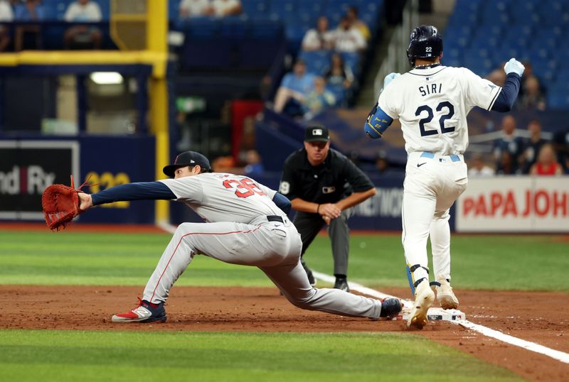 Sep 17, 2024; St. Petersburg, Florida, USA; Boston Red Sox first base Triston Casas (36) forces out Tampa Bay Rays outfielder Jose Siri (22) during the third inning at Tropicana Field. Mandatory Credit: Kim Klement Neitzel-Imagn Images