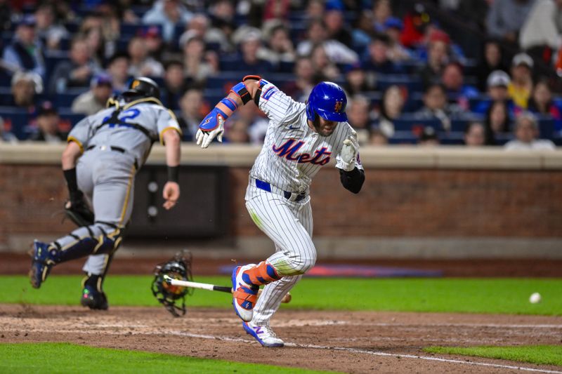 Apr 15, 2024; New York City, New York, USA; New York Mets second base Jeff McNeil races to first bases after a passed ball by Pittsburgh Pirates catcher Joey Bart (42) during the eighth inning at Citi Field. Mandatory Credit: John Jones-USA TODAY Sports