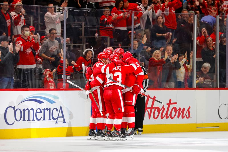 Dec 9, 2023; Detroit, Michigan, USA; The Detroit Red Wings celebrate a goal by Detroit Red Wings right wing Patrick Kane (88) during the first period at Little Caesars Arena. Mandatory Credit: Brian Bradshaw Sevald-USA TODAY Sports