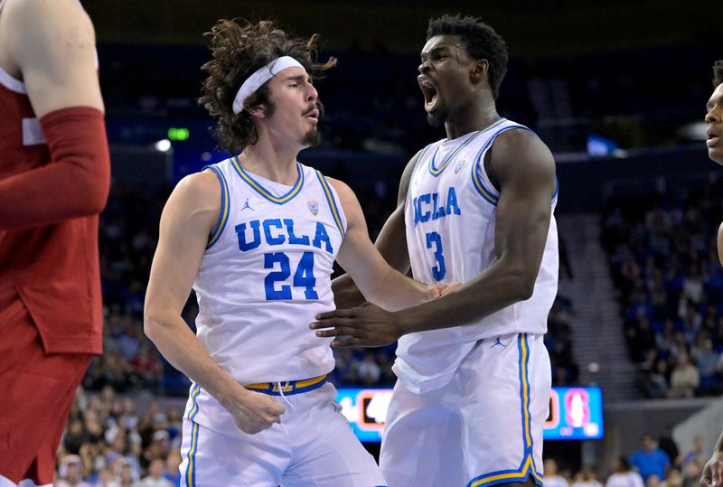 Feb 16, 2023; Los Angeles, California, USA; UCLA Bruins guard Jaime Jaquez Jr. (24) and forward Adem Bona (3) celebrate after a basket in the second half against the Stanford Cardinal at Pauley Pavilion presented by Wescom. Mandatory Credit: Jayne Kamin-Oncea-USA TODAY Sports