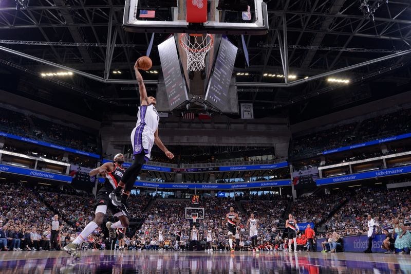 SACRAMENTO, CA - OCTOBER 13: Keegan Murray #13 of the Sacramento Kings dunks the ball during the game against the Portland Trail Blazers during a NBA preseason game on October 13, 2024 at Golden 1 Center in Sacramento, California. NOTE TO USER: User expressly acknowledges and agrees that, by downloading and or using this Photograph, user is consenting to the terms and conditions of the Getty Images License Agreement. Mandatory Copyright Notice: Copyright 2024 NBAE (Photo by Rocky Widner/NBAE via Getty Images)