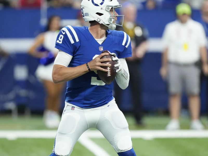 Indianapolis Colts quarterback Nick Foles (9) looks to throw in the first half of an NFL preseason football game against the Tampa Bay Buccaneers in Indianapolis, Saturday, Aug. 27, 2022. (AP Photo/AJ Mast)