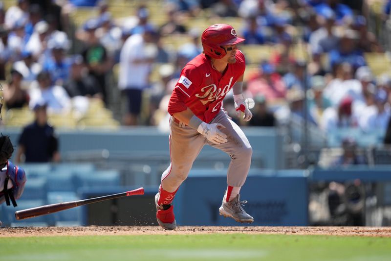 Jul 30, 2023; Los Angeles, California, USA; Cincinnati Reds center fielder TJ Friedl (29) hits a run-scoring single in the sixth inning against the Los Angeles Dodgers at Dodger Stadium. Mandatory Credit: Kirby Lee-USA TODAY Sports