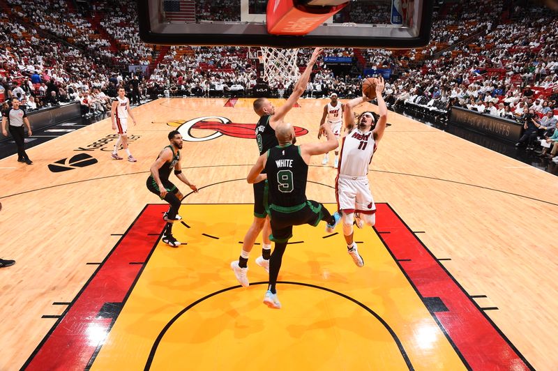 MIAMI, FL - APRIL 27: Jaime Jaquez Jr. #11 of the Miami Heat drives to the basket during the game against the Boston Celtics during Round 1 Game 3 of the 2024 NBA Playoffs on April 27, 2024 at Kaseya Center in Miami, Florida. NOTE TO USER: User expressly acknowledges and agrees that, by downloading and or using this Photograph, user is consenting to the terms and conditions of the Getty Images License Agreement. Mandatory Copyright Notice: Copyright 2024 NBAE (Photo by Brian Babineau/NBAE via Getty Images)