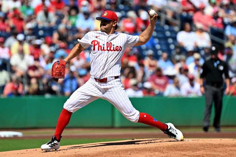 Mar 10, 2026; Clearwater, Florida, USA; Philadelphia Phillies starting pitcher Tanner Banks (58) throws in the first inning against the New York Yankees during spring training  at BayCare Ballpark. Mandatory Credit: Jonathan Dyer-Imagn Images