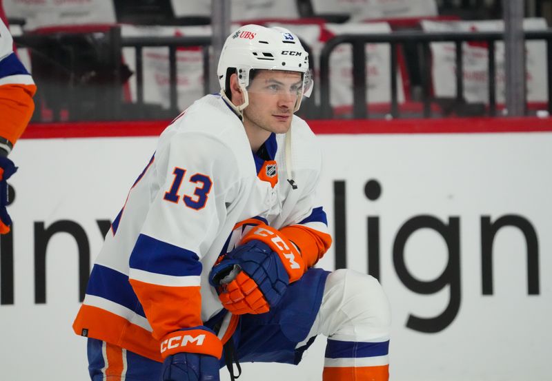 Apr 22, 2024; Raleigh, North Carolina, USA; New York Islanders center Mathew Barzal (13) looks on during the warmups before the game against the Carolina Hurricanes in game two of the first round of the 2024 Stanley Cup Playoffs at PNC Arena. Mandatory Credit: James Guillory-USA TODAY Sports