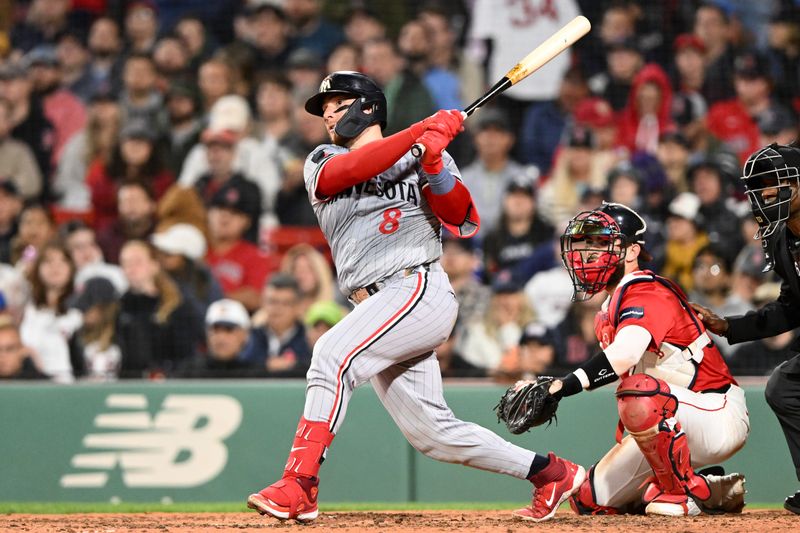 Sep 20, 2024; Boston, Massachusetts, USA; Minnesota Twins catcher Christian Vazquez (8) bats against the Boston Red Sox during the seventh inning at Fenway Park. Mandatory Credit: Brian Fluharty-Imagn Images