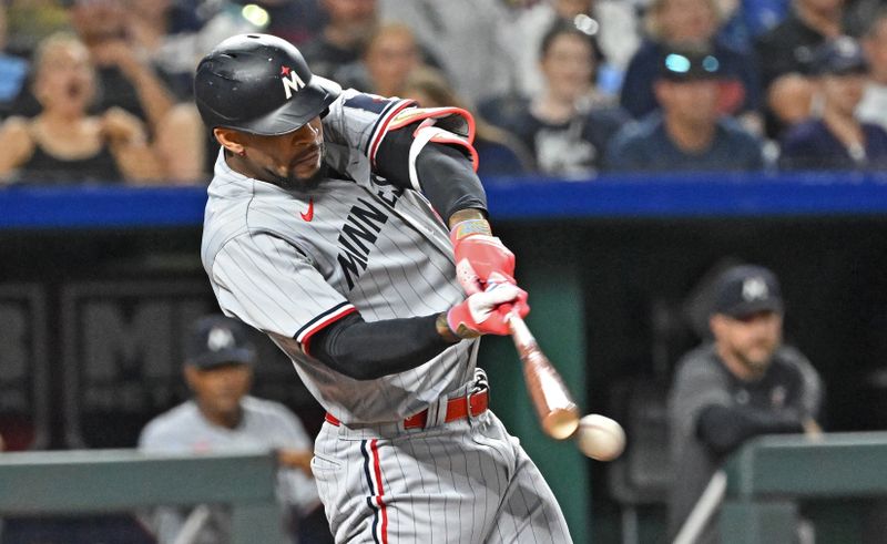 Jul 29, 2023; Kansas City, Missouri, USA;  Minnesota Twins designated hitter Byron Buxton (25) doubles against the Kansas City Royals during the eighth inning at Kauffman Stadium. Mandatory Credit: Peter Aiken-USA TODAY Sports