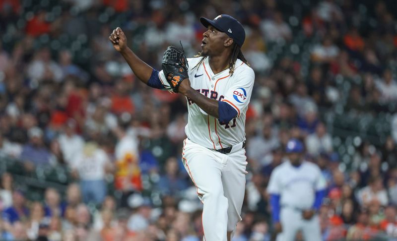 Apr 3, 2024; Houston, Texas, USA; Houston Astros relief pitcher Rafael Montero (47) reacts after delivering a pitch during the seventh inning against the Toronto Blue Jays at Minute Maid Park. Mandatory Credit: Troy Taormina-USA TODAY Sports