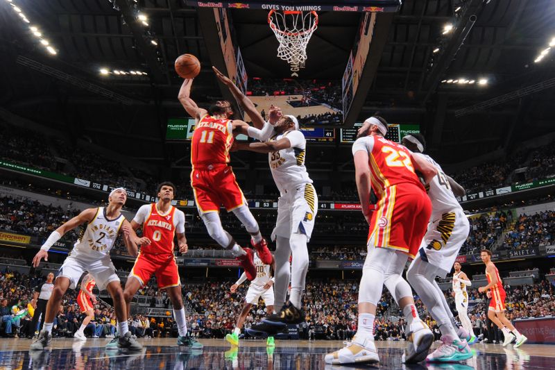 INDIANAPOLIS, IN - FEBRUARY 1: Trae Young #11 of the Atlanta Hawks drives to the basket during the game against the Indiana Pacers on February 1, 2025 at Gainbridge Fieldhouse in Indianapolis, Indiana. NOTE TO USER: User expressly acknowledges and agrees that, by downloading and or using this Photograph, user is consenting to the terms and conditions of the Getty Images License Agreement. Mandatory Copyright Notice: Copyright 2025 NBAE (Photo by Ron Hoskins/NBAE via Getty Images)