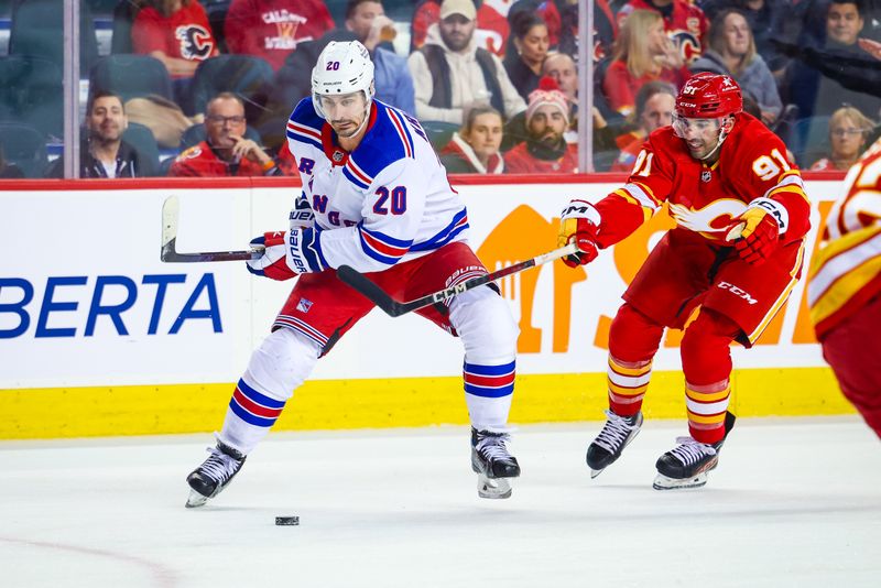 Oct 24, 2023; Calgary, Alberta, CAN; New York Rangers left wing Chris Kreider (20) controls the puck in front of Calgary Flames center Nazem Kadri (91) during the first period at Scotiabank Saddledome. Mandatory Credit: Sergei Belski-USA TODAY Sports