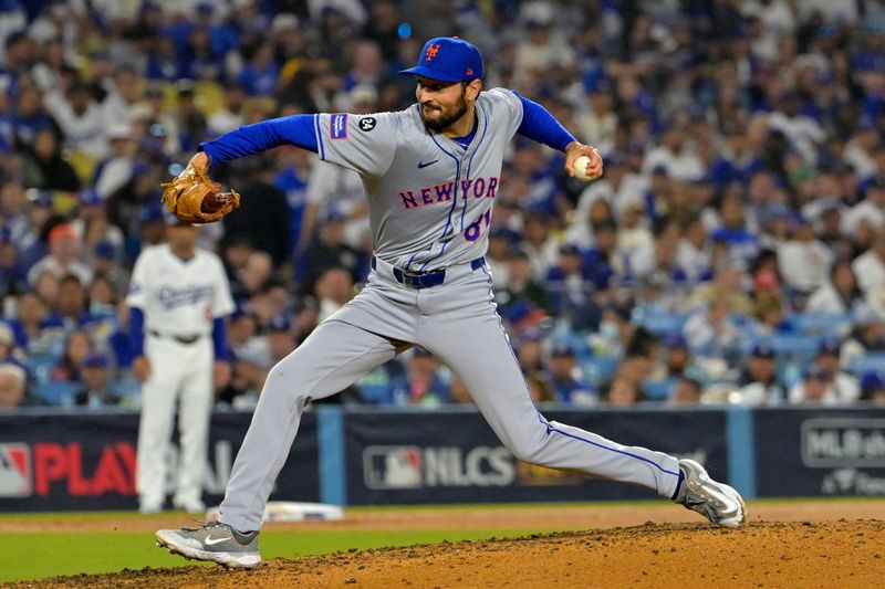 Oct 13, 2024; Los Angeles, California, USA; New York Mets pitcher Danny Young (81) throws a pitch against the Los Angeles Dodgers in the sixth inning during game one of the NLCS for the 2024 MLB Playoffs at Dodger Stadium. Mandatory Credit: Jayne Kamin-Oncea-Imagn Images