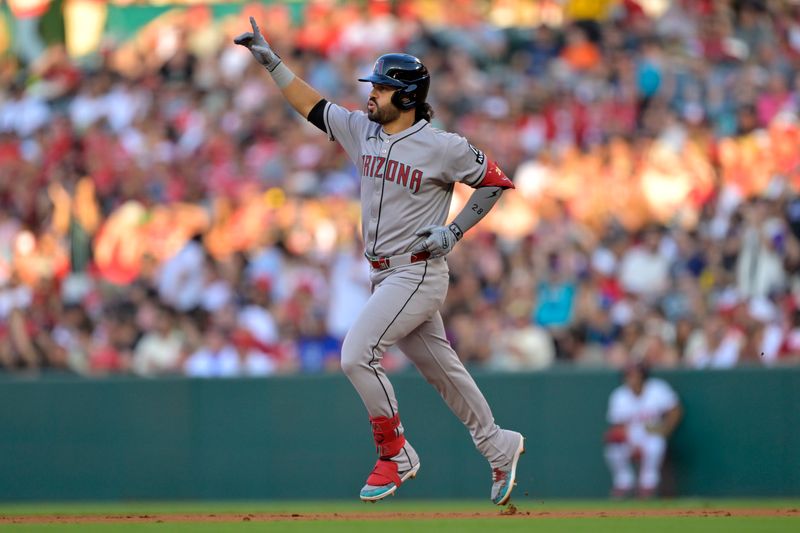 Jul 12, 2025; Anaheim, California, USA;  Arizona Diamondbacks third baseman Eugenio Suarez (28) rounds the bases after a solo home run during the second inning against the Los Angeles Angels at Angel Stadium. Mandatory Credit: Jayne Kamin-Oncea-Imagn Images