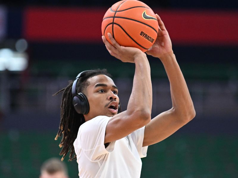 Feb 27, 2024; Syracuse, New York, USA; Syracuse Orange forward Chris Bell warms up before a game against the Virginia Tech Hokies at the JMA Wireless Dome. Mandatory Credit: Mark Konezny-USA TODAY Sports