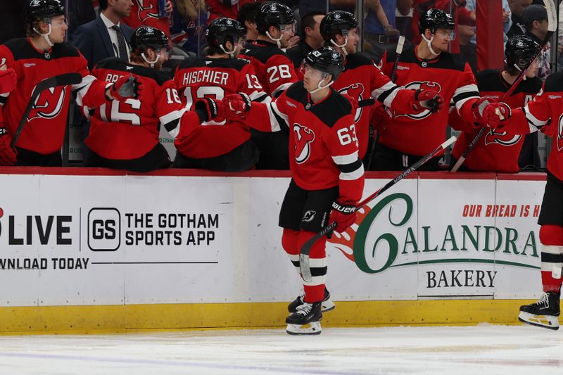 Mar 7, 2026; Newark, New Jersey, USA; New Jersey Devils left wing Jesper Bratt (63) celebrates his goal against the New York Rangers during the first period at Prudential Center. Mandatory Credit: Thomas Salus-Imagn Images