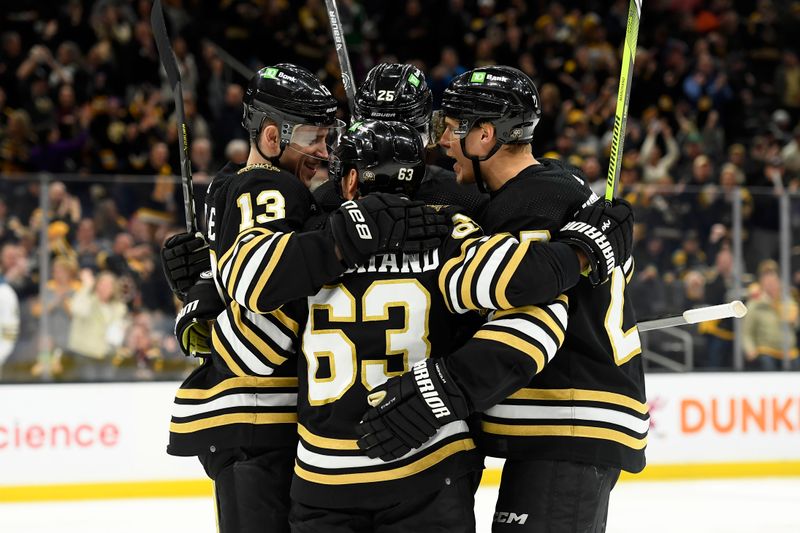 Feb 8, 2024; Boston, Massachusetts, USA; Boston Bruins left wing Brad Marchand (63) celebrates his goal with his teammates during the first period against the Vancouver Canucks at TD Garden. Mandatory Credit: Bob DeChiara-USA TODAY Sports