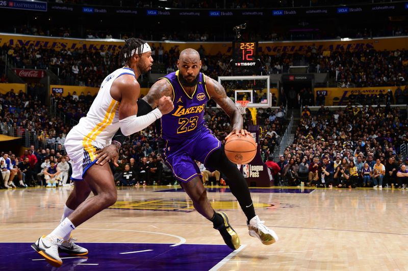 LOS ANGELES, CA - FEBRUARY 6: LeBron James #23 of the Los Angeles Lakers drives to the basket during the game against the Golden State Warriors on February 6, 2025 at Crypto.Com Arena in Los Angeles, California. NOTE TO USER: User expressly acknowledges and agrees that, by downloading and/or using this Photograph, user is consenting to the terms and conditions of the Getty Images License Agreement. Mandatory Copyright Notice: Copyright 2025 NBAE (Photo by Adam Pantozzi/NBAE via Getty Images)
