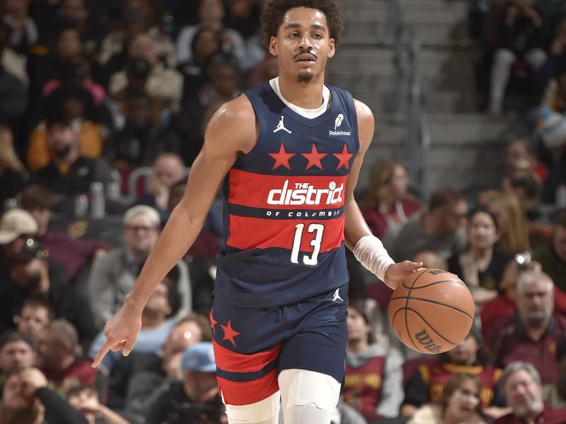 CLEVELAND, OH - DECEMBER 13: Jordan Poole #13 of the Washington Wizards dribbles the ball during the game against the Cleveland Cavaliers on December 13, 2024 at Rocket Mortgage FieldHouse in Cleveland, Ohio. NOTE TO USER: User expressly acknowledges and agrees that, by downloading and/or using this Photograph, user is consenting to the terms and conditions of the Getty Images License Agreement. Mandatory Copyright Notice: Copyright 2024 NBAE (Photo by David Liam Kyle/NBAE via Getty Images)