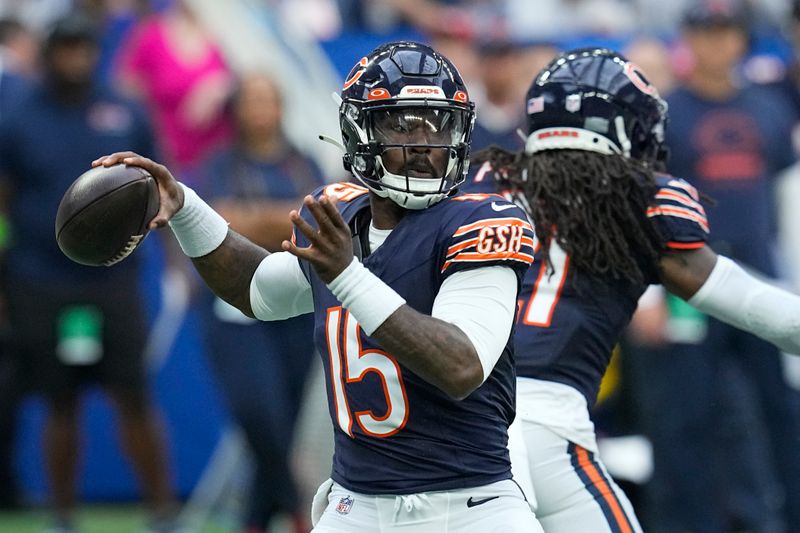 Chicago Bears quarterback PJ Walker (15) looks for a receiver during the first half of the NFL football team's preseason game against the Indianapolis Colts in Indianapolis, Saturday, Aug. 19, 2023. (AP Photo/Darron Cummings)